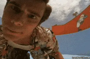 Jim Carey gif of him looking at the camera up close
